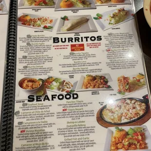 a menu for burritos and seafood