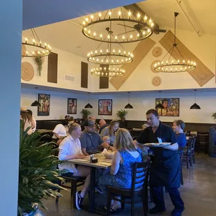 Back part of restaurant. Lovely light fixtures
