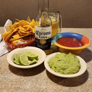 guacamole and chips on a table