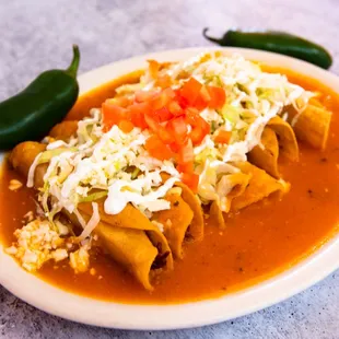 a plate of enchiladas