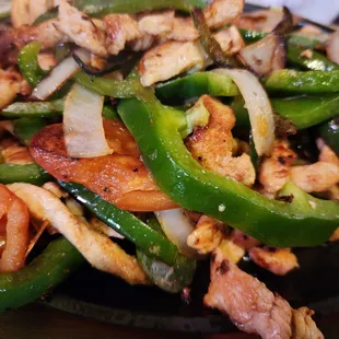 Chicken fajitas the portion is huge and the flavor just explodes off the platter..