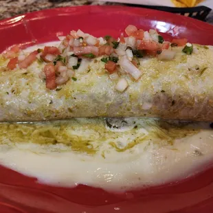 Cali burrito, large in charge with great portion of peppers, onions and chicken with just the right amount of taters