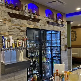 a bar with a television in the background