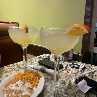 two margaritas on a table