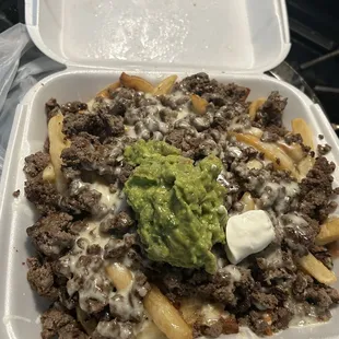 Heavy cheese and lots of Guacamole just like I like it!!