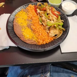 Filiberto&apos;s Chicken Fajitas in Sun City West on RH Johnson.  Plenty of Chicken, both peppers, yummy beans and rice.