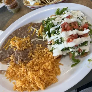 Chicken flautas (w/ rice and beans), asada tacos w/cheese and sour cream, salsa