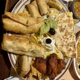 combination plate- nachos , taquitos, wings, chimichangas, quesadilla