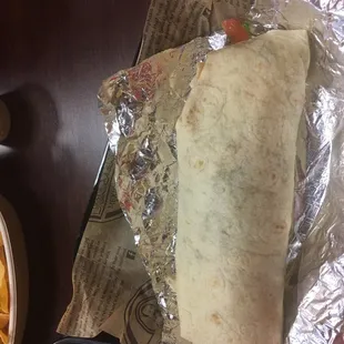 Tinga (chicken with onions and chipotle sauce) burrito