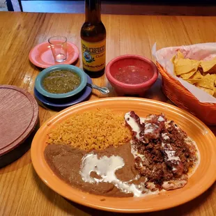 "Pollo Chorizo"--Grilled chicken breast topped with melted cheese sauce, Mexican sausage, and bacon strips. Very tasty!