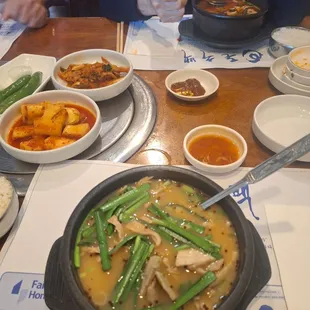 The Doeji Gook Bab - Pork soup with rice on the side. Comes with chives, minced peppers, dadaegi (red pepper paste), and shrimp sauce