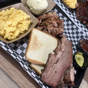 Brisket, pulled pork, potato salad, and mac n cheese.