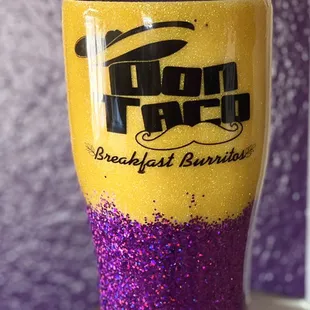 a yellow and purple tumbler