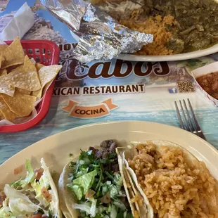 Fish taco, carne Asada taco, and a shrimp taco
 Chili Verde plate