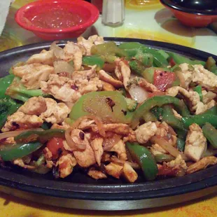 Chicken fajitas with undercooked peppers