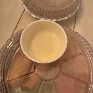 $18 for this.... That's the queso order  it's basically a thimble. Way over priced for meat and cheese.