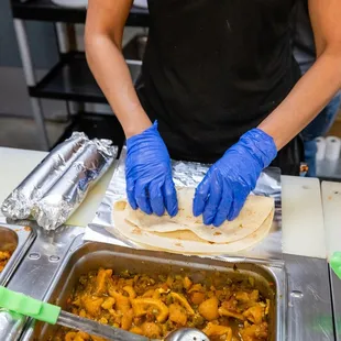 a person preparing food in a kitchen