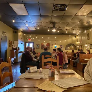 a group of people sitting at a table