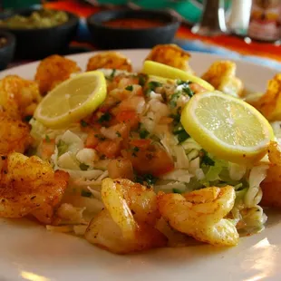 a plate of shrimp and rice