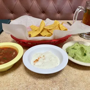 Salsa, white dip, and guacamole dip