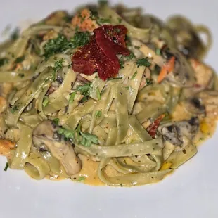 Lobster with spinach alfredo.