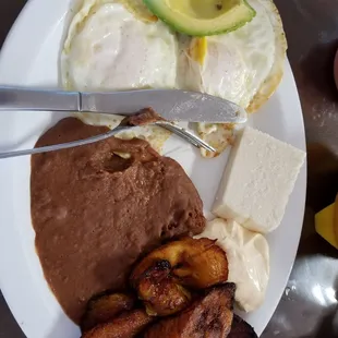Salvadorean breakfast. Beans taste from the can so not cool. Still, the breakfast was good.