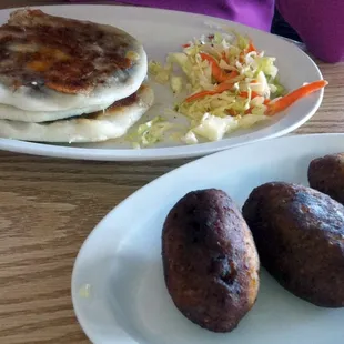 Pupusas  curtido (which is reallly good!) and 3 empanadas de frijol. Delicious! NO diet food.
