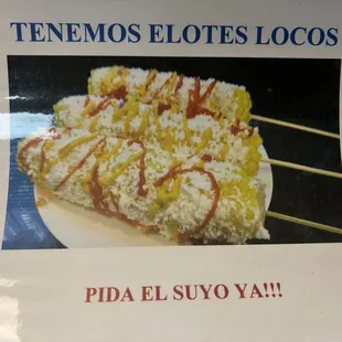 Elotes locos - with grated cheese, cream and spicy sauces
