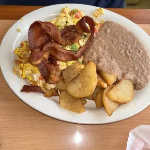 When was rancheros with beans potatoes bacon homemade flour tortillas.