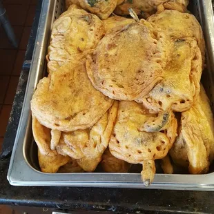 a tray of fried tortillas