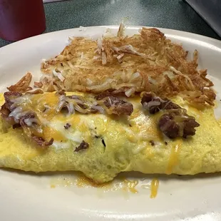 Bacon and cheese omelet and hashbrowns