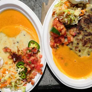 Two orders of a pupusa (pork, beans, cheese) with curtido (cabbage slaw), pico de gallo, tomato sauce, and sour cream.