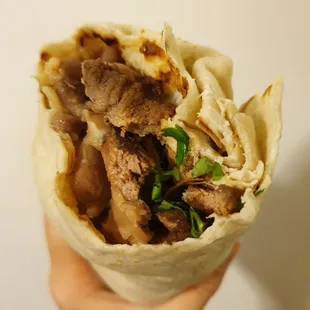 Carne asada burrito (grande $10.95)