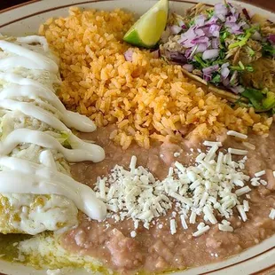 Combination platter. Chicken enchilada and Carnitas taco.