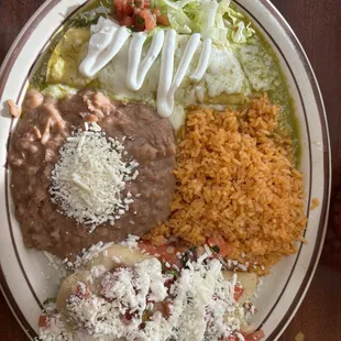 green enchilada and cheese tamale w rice and beans
