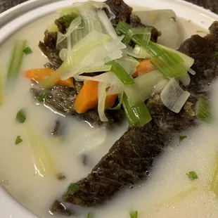 a bowl of beef and vegetable soup