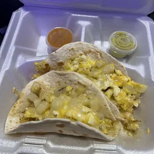 Potato egg and cheese tacos on flour tortillas