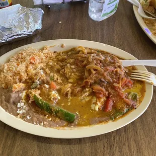 Oops! I eat part of it before taking picture of Huevos Rancheros! They do offer a choice of tortillas on the side