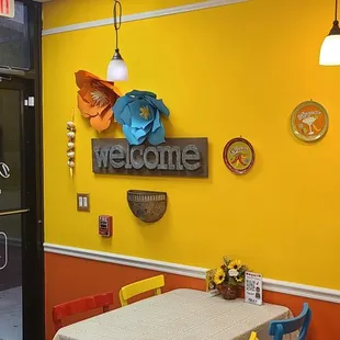 a table and chairs in a restaurant