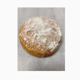 a donut covered in powdered sugar