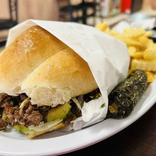 Carne Asada Torta, fresh avocado, tomatoes, jalapeños and delicious carne! The bread was fresh like it was baked today.