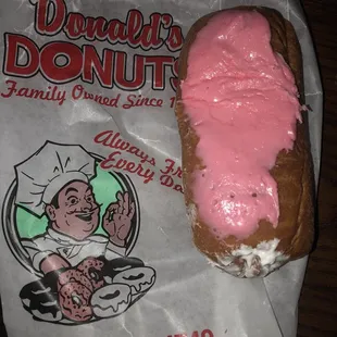 Pink cream filled donut