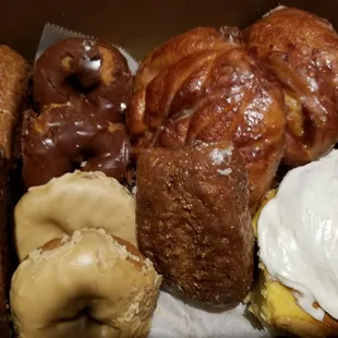 Apple fritters, cinnamon rolls, iced cakes.