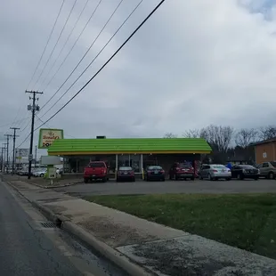 Look for green topped building.