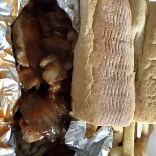 Ribs tibs with garlic bread &amp; fries, bought for my son he didn&apos;t like it.