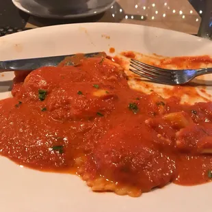 a plate of food with a fork and knife