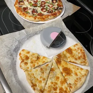 Both pizzas amazing - cheese with white sauce and combo pizza