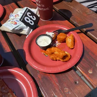 a plate of food on a picnic table