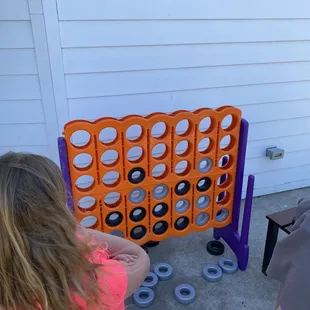 a woman and a child playing a game