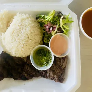 Churrasco with salad, rice and beans
